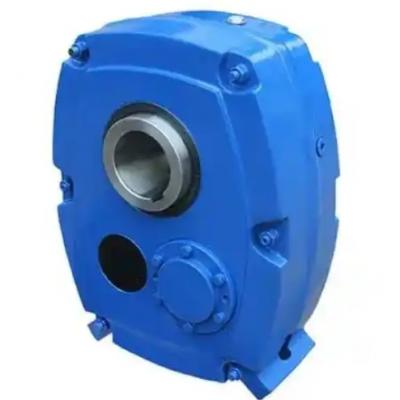 What are the differences between a shaft-mounted helical gear reducer and a standard reducer?
