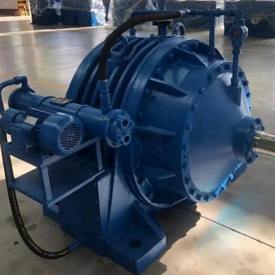 After foundation settlement, what inspections and maintenance are required for the NBD560-112 planetary reducer?