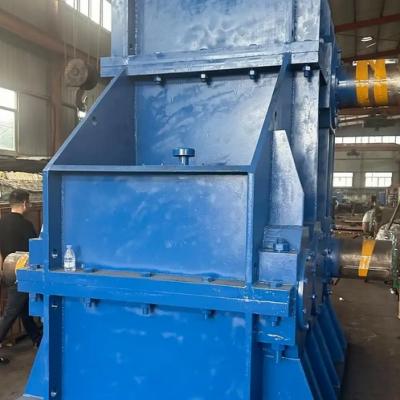 What could be the reasons for abnormal vibrations during the trial operation of a large gear reducer after maintenance?