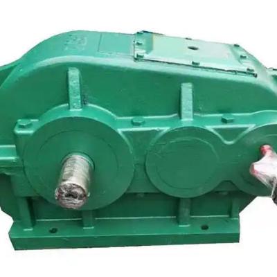 What factors need to be considered when selecting the housing material for ZQ series soft tooth surface reducers