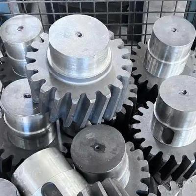 What are the criteria for selecting materials for gearbox shaft components